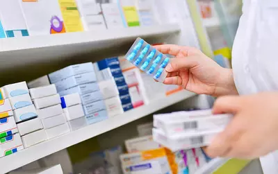 customer shopping for medications at pharmacy